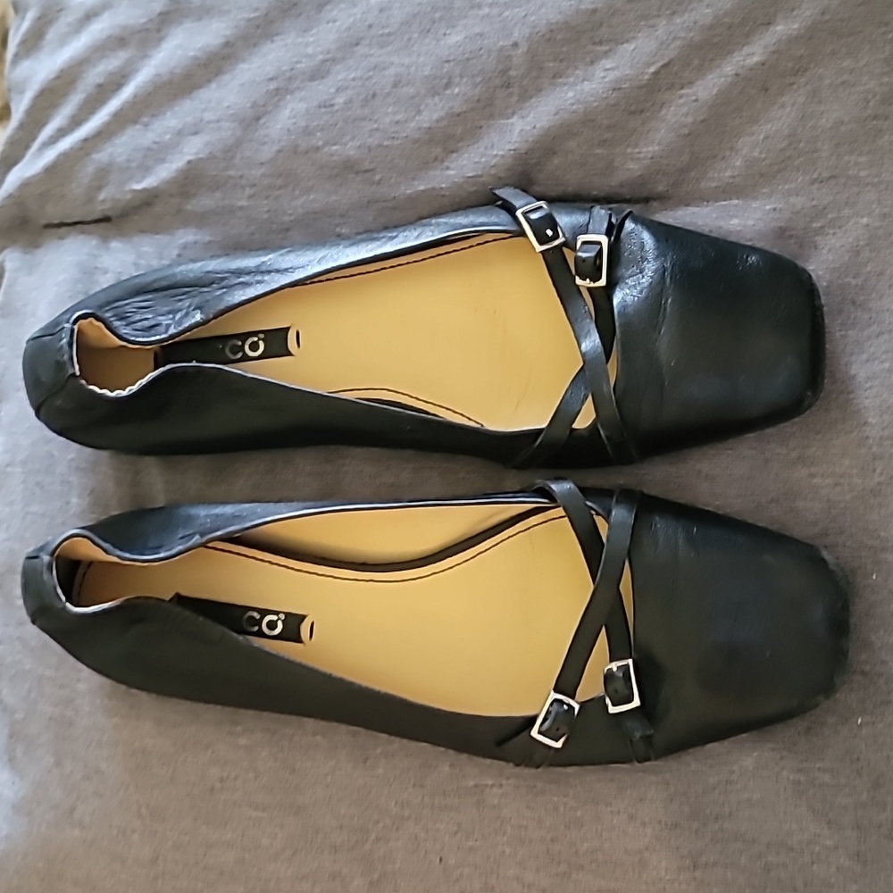 Ecco black leather flats with silver buckles